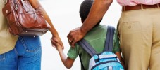 Parents Walking Son to School