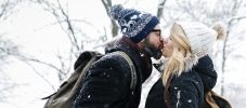 Couple in love with balloons - winter day of St. Valentine