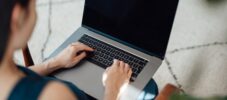 Woman using laptop in office