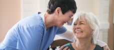 Nurse taking care of elderly lady